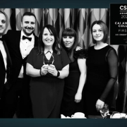 An image of CCI staff holding the CAI Award, first place.