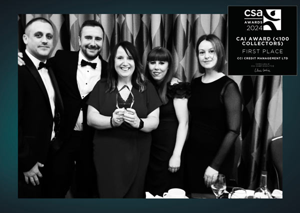 An image of CCI staff holding the CAI Award, first place.