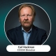 An image of the CCICM Director, Carl Hackman. The background is a dark blue with a circled image of Carl Hackman.